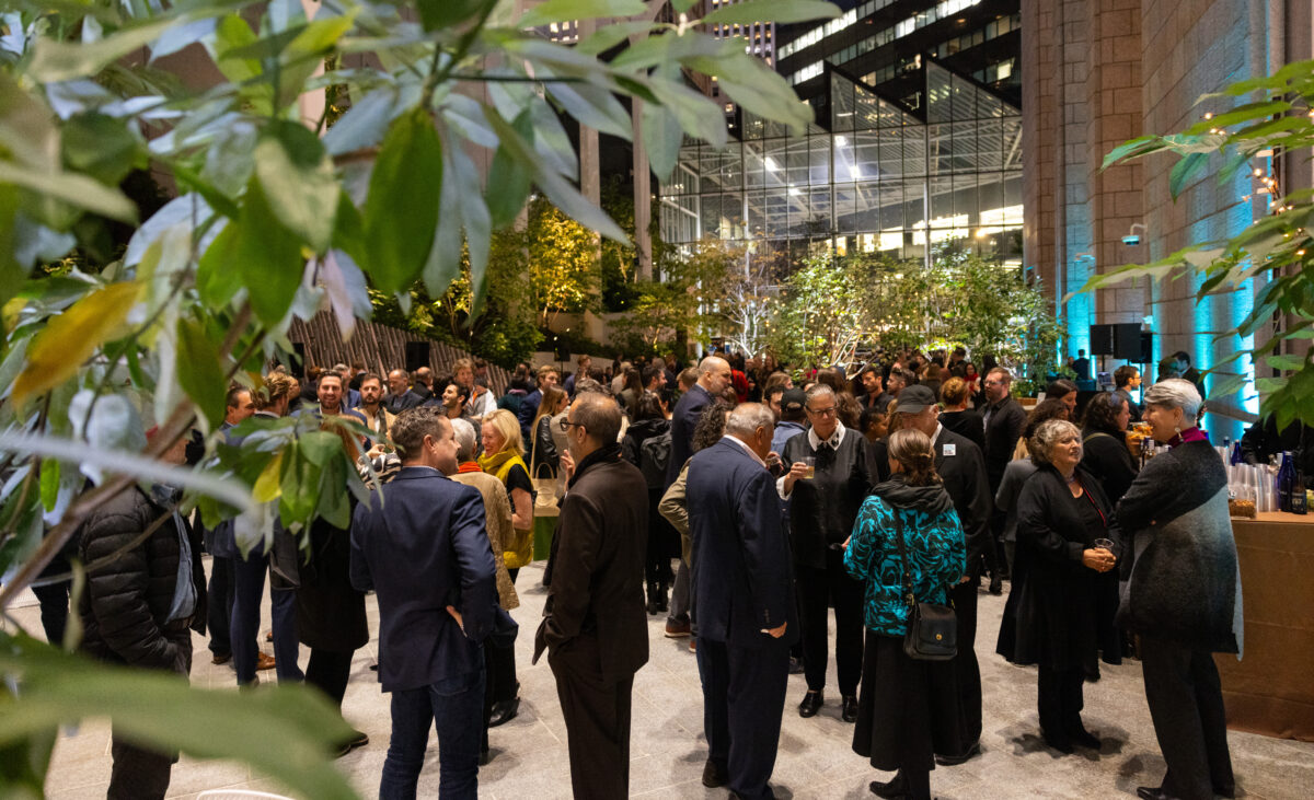 Guests gathered at a corporate launch event at 550 Madison Garden